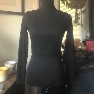 Forever 21 Ribbed Black V-Neck Crop Top
Size Medium